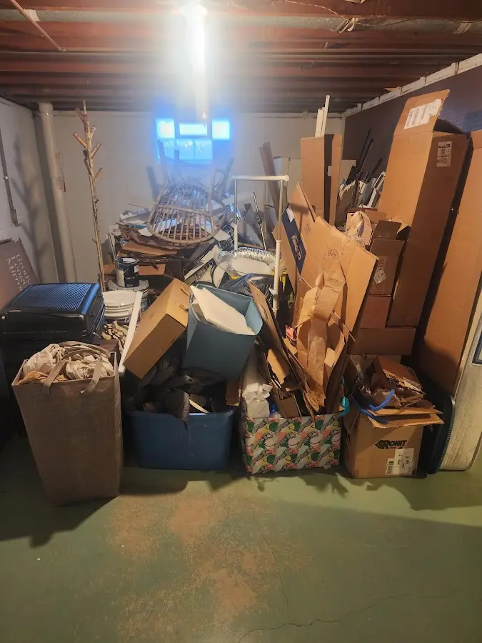 Roll-off dumpster container at job site for 2 Yard Dumpster Rental in Jefferson